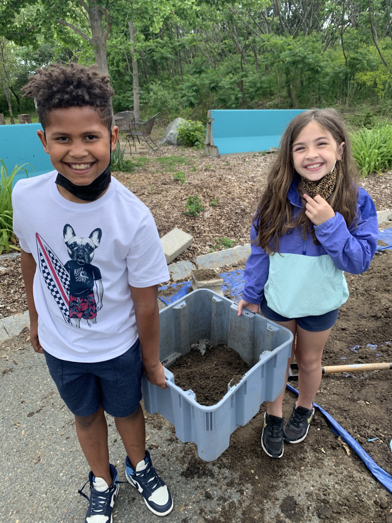Kids with garden dirt